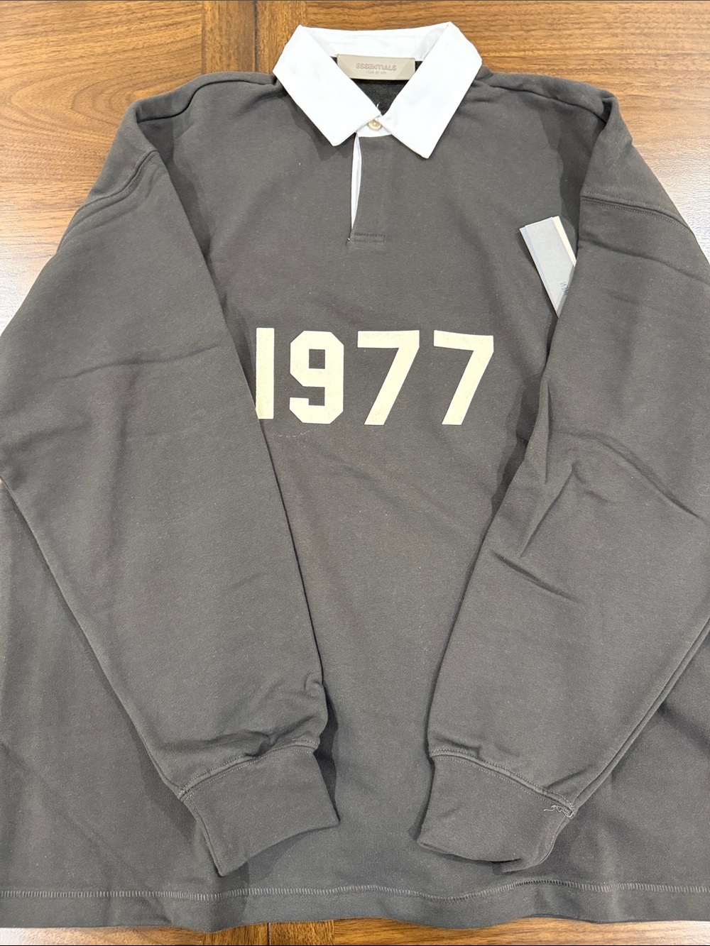 Essentials Men’s. off Black Rugby Sweatshirt with Cream '1977' Print
